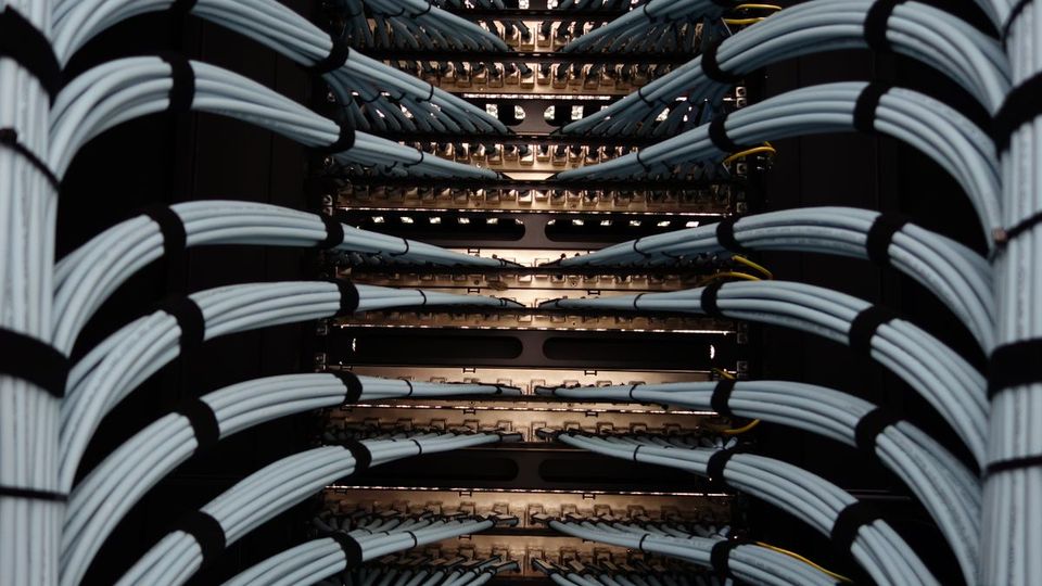 Structured data cabling neatly dressed into a network rack and patch panels
